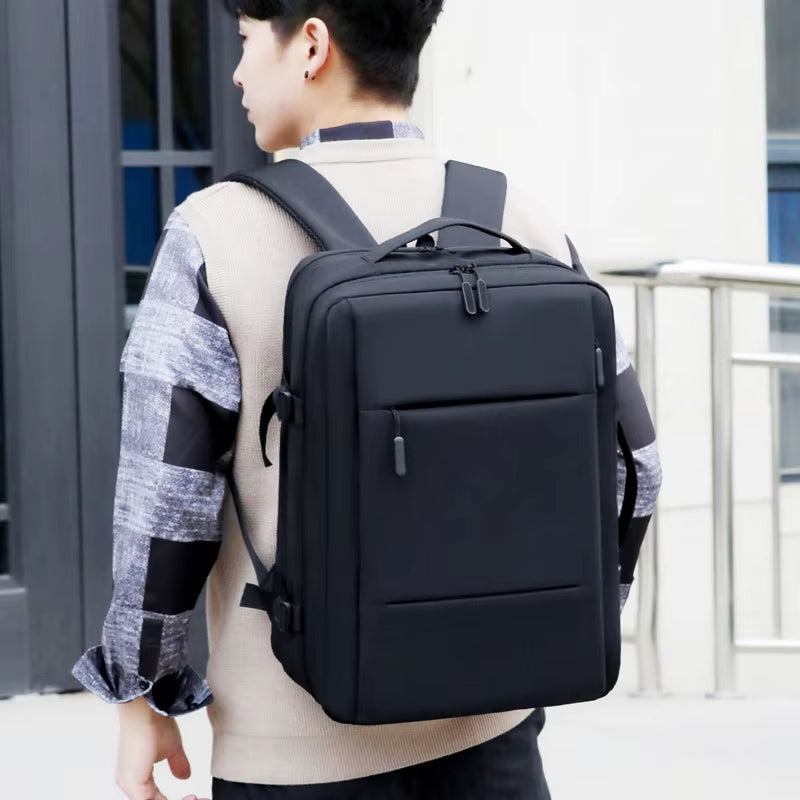 Versatile Business & Travel Backpack for Men - Expandable, Waterproof with USB Charging Port